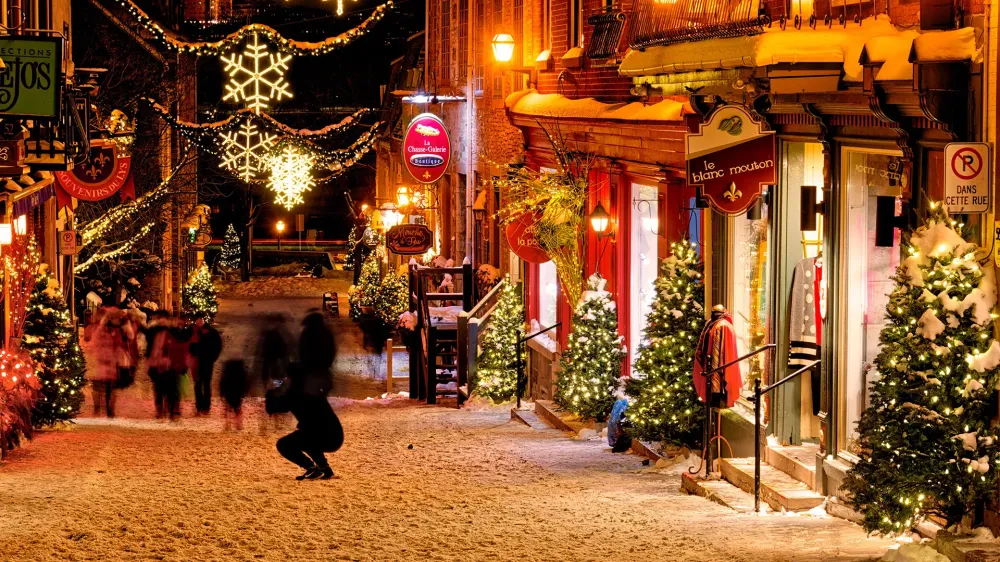 quebec city at night with holiday decorations.